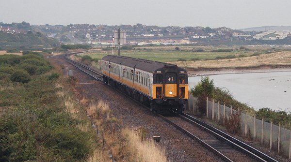 despite those window bars....mind those heads!