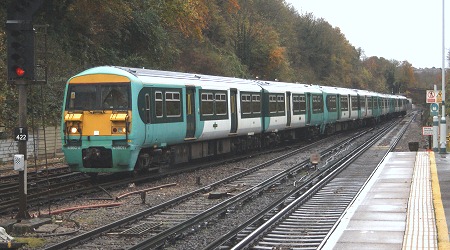 456011, 456010, 456004 and 456019 approach platform 1 at Preston Park from the north on 20th November 2013
