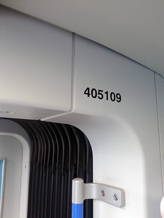 Interior display of the car number near the full width connection of car 5